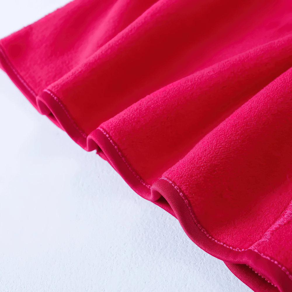 Close-up of a soft rose red fleece fabric, showcasing the Girls Rose Red Fleece Zip Jacket with Pockets - SF3530.