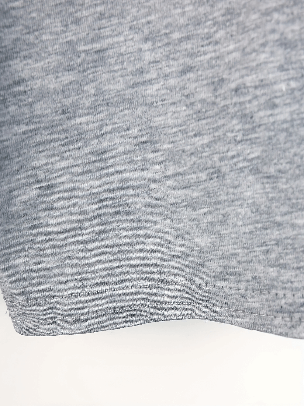 Close-up of grey fabric texture for Girls Skirted Stretch Shorts for Active Play Kids - SF3857, showing stretchiness and quality.