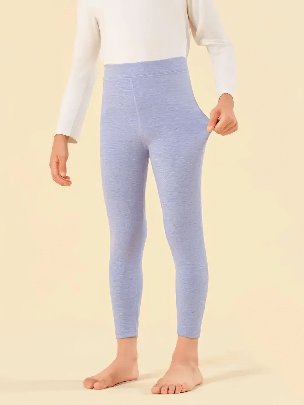 Young girl wearing Girls Sport Leggings with Compression Fit - SF3663, demonstrating flexibility and comfort in light blue.