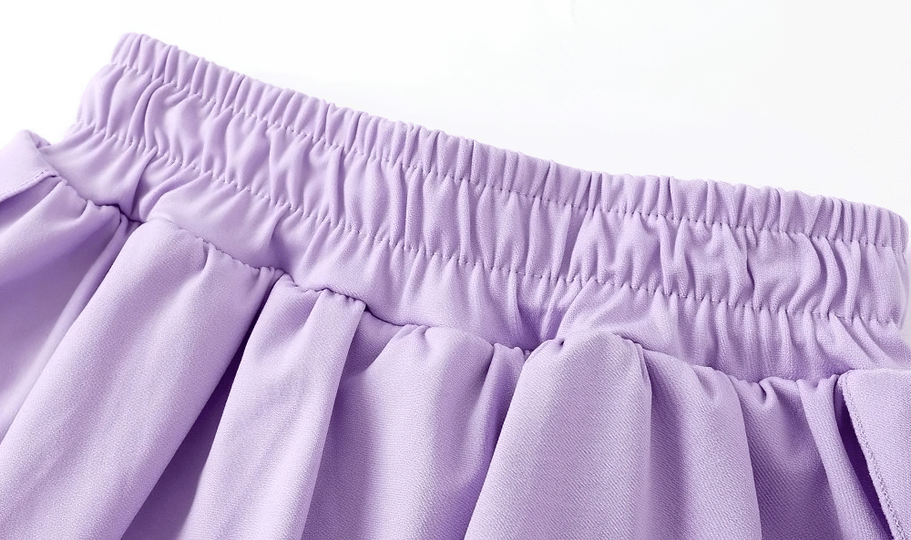 Close-up of lilac-colored waistband and flowy skirt detail on Girls Sports Leggings with Flow Skirt Design - SF3673