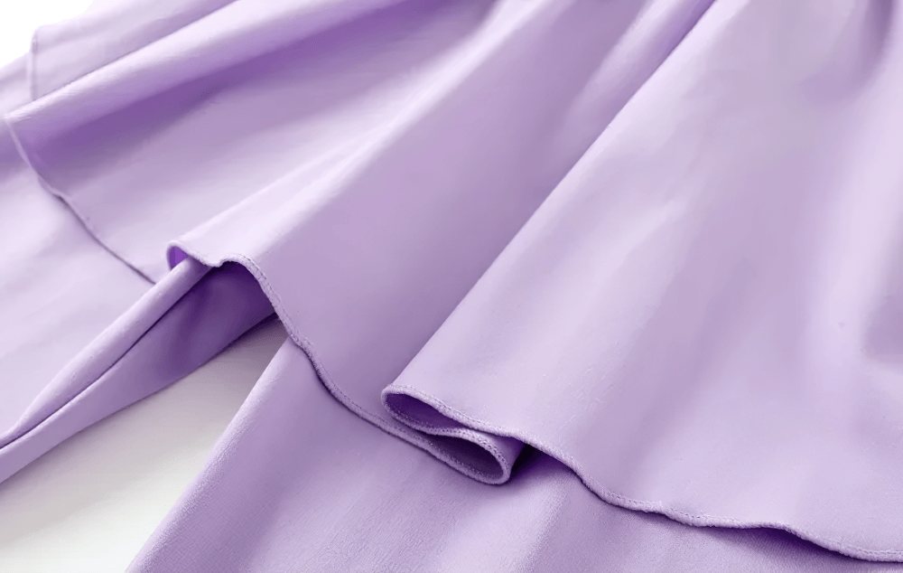 Close-up of fabric detail on Girls Sports Leggings with Flow Skirt Design - SF3673 in soft lavender color.