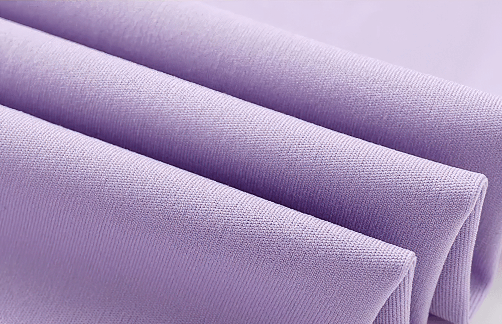 Close-up of lilac fabric texture used in Girls Sports Leggings with Flow Skirt Design - SF3673, showcasing the material's quality.
