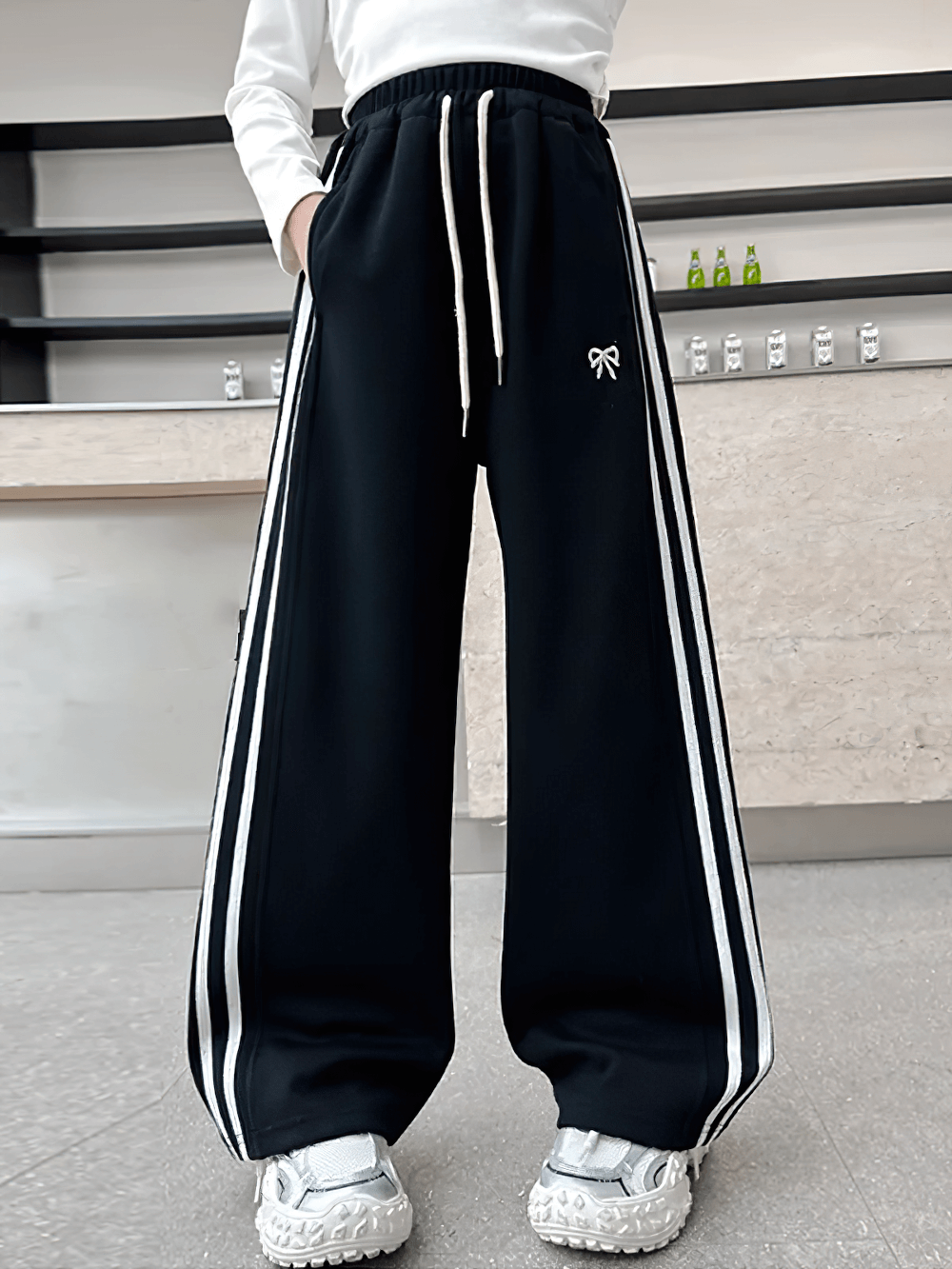 Girls Sporty Pants with Side Stripes and Drawstring - SF3620 stylish black pants with elastic waist and white side stripes.