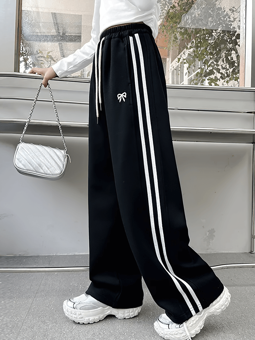Girls Sporty Pants with Side Stripes and Drawstring - SF3620, featuring a stylish black design with side stripes and comfortable fit.