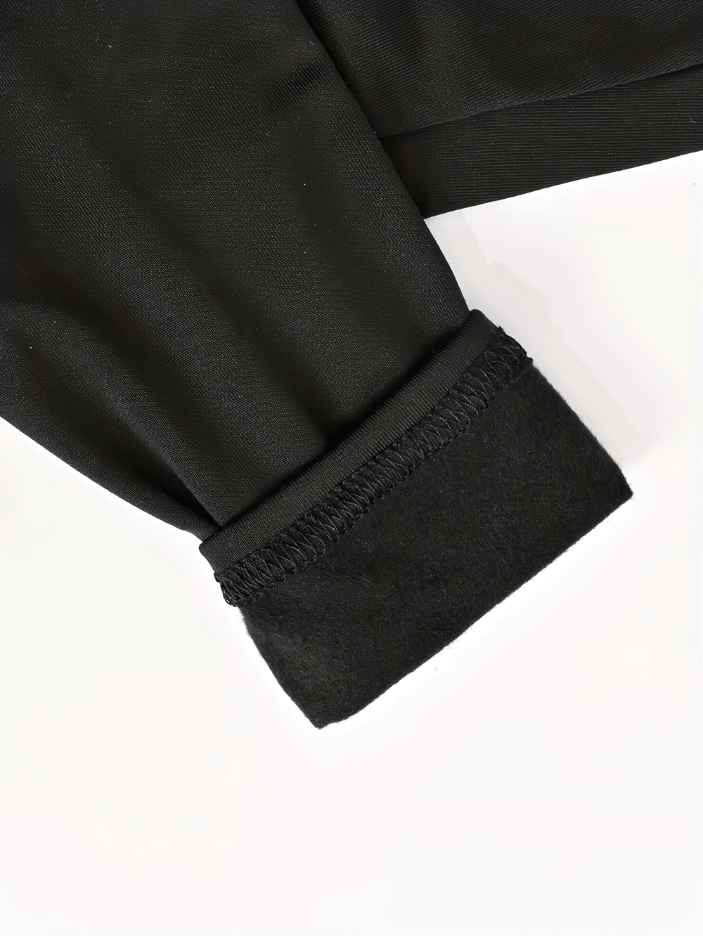 Close-up of black fabric showing high-quality stitching detail on Girls Star Print High-Waist Stretch Fitness Leggings - SF3777.