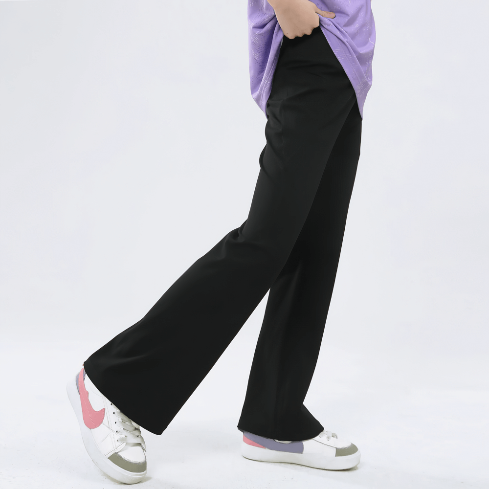 Girl wearing Girls Stretch Flared Pants with Breathable Fabric - SF3610, showcasing the comfortable stretch and sleek flared design.