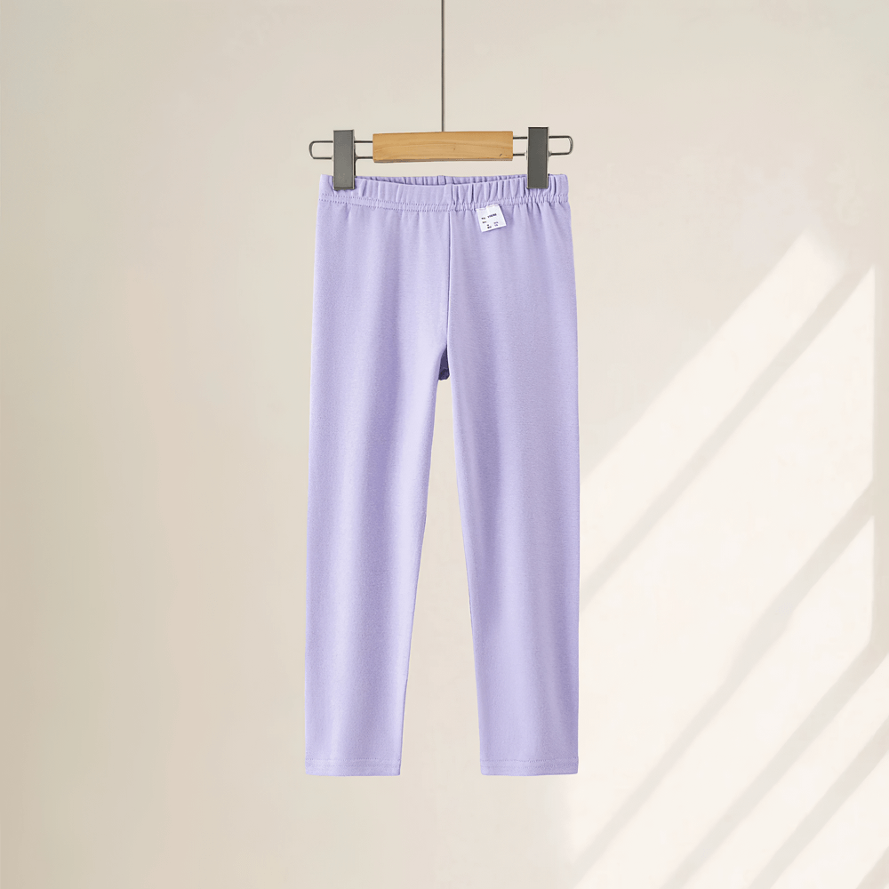 Girls Stretchy Sport Leggings in Soft Solid Colors - SF3681 hanging in bright light
