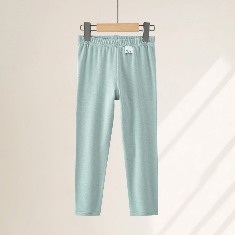 Girls Stretchy Sport Leggings in Soft Solid Colors - SF3681 hanging on a hanger showcasing lightweight fabric and sleek fit.