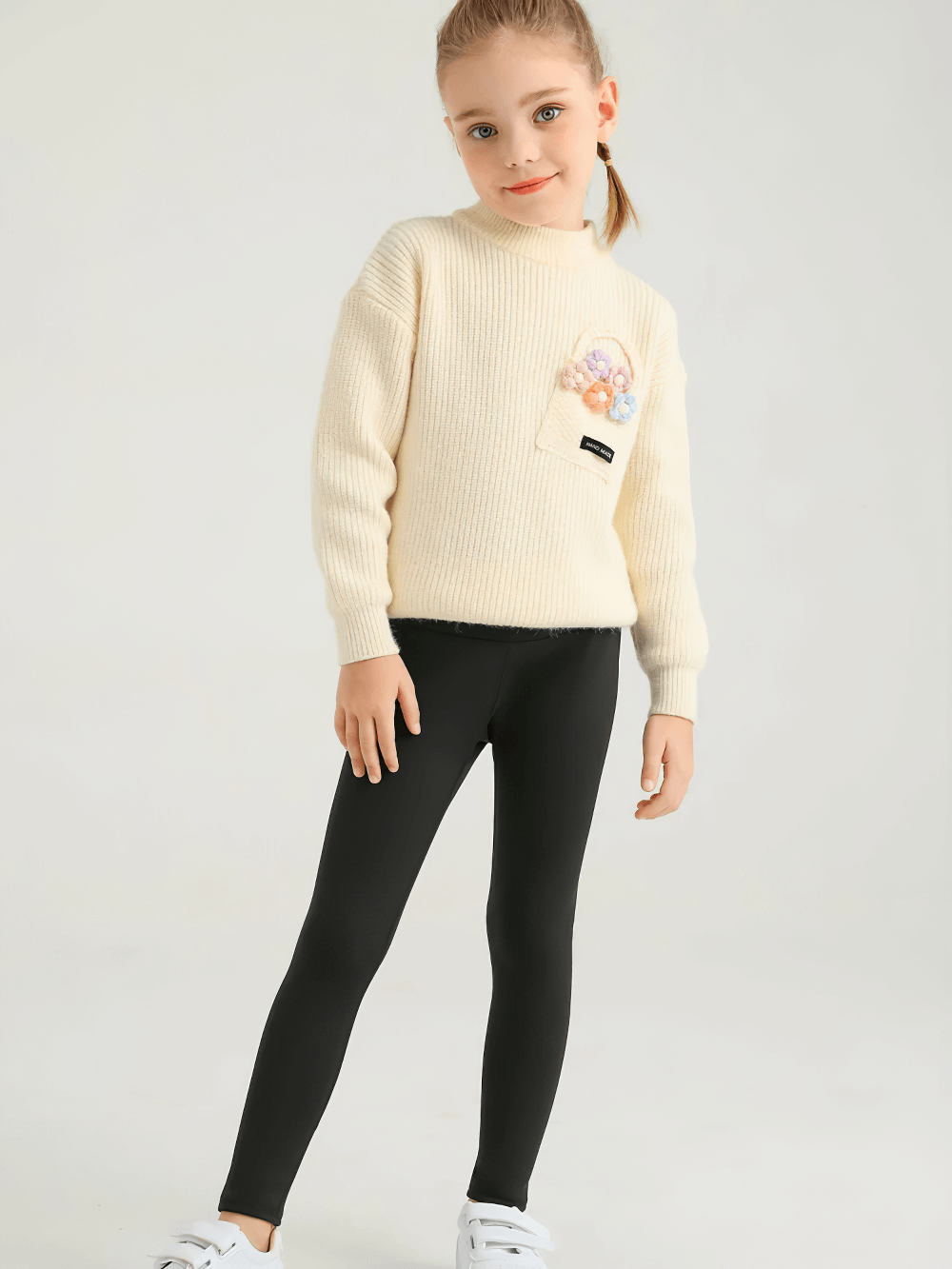 Girl wearing Girls Thermal Fleece Lined Sport Leggings - SF3862, ideal for cold weather and outdoor play, showcasing warmth and comfort.