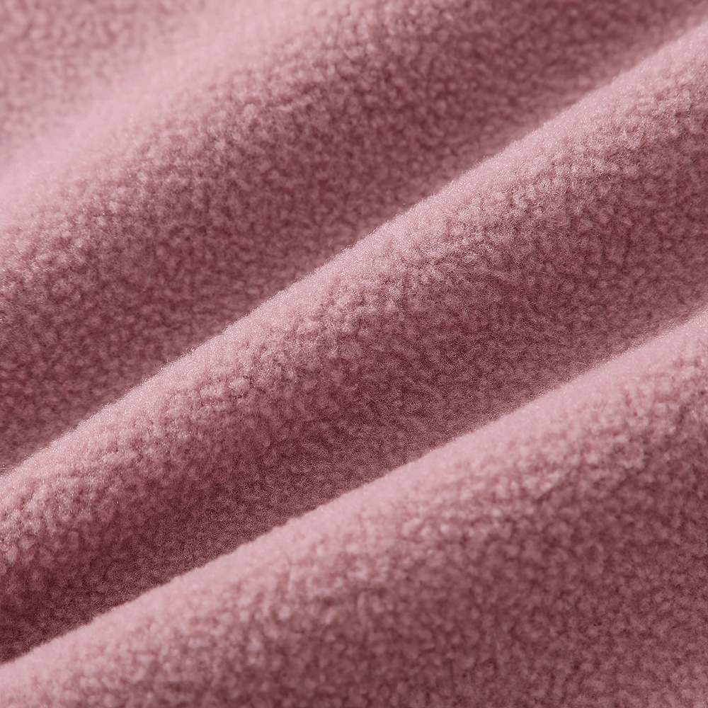 Close-up of soft fleece fabric of Girls Waterproof Heart Print Hooded Jacket - SF3569 in delicate pink hue