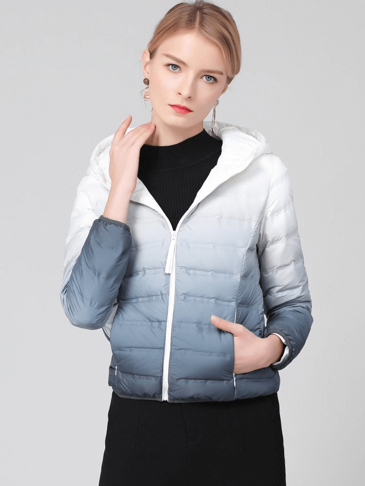Gradient Stylish Sports Women's Down Jacket with Hood in blue and white tones, featuring zipper closure and pockets, worn by a model.