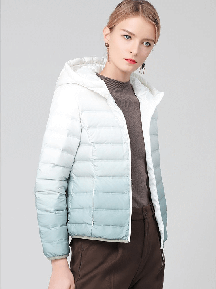 Gradient stylish women's down jacket with hood, featuring a modern look and cozy duck-down filling for warmth and durability.