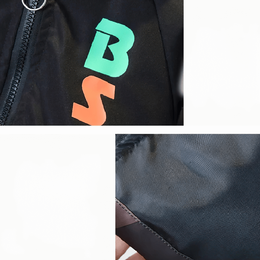 Close-up of the Graphic Zip Jacket with Hood and Contrast Panels - SF3535, showing geometric print and black fabric detailing.