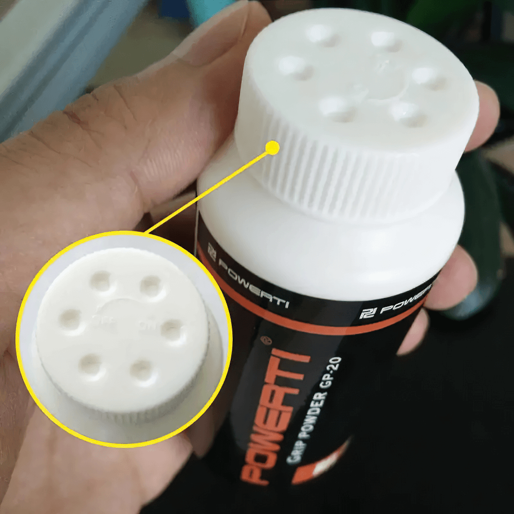 Grip Powder for Weightlifting and Climbing - SF3556 in a hand, showing anti-slip chalk powder bottle details.