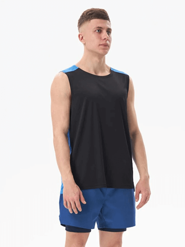 Model wearing Gym Breathable Double Color Tank Top for Men - SF1813, made of lightweight polyester, featuring a stylish black and blue design.