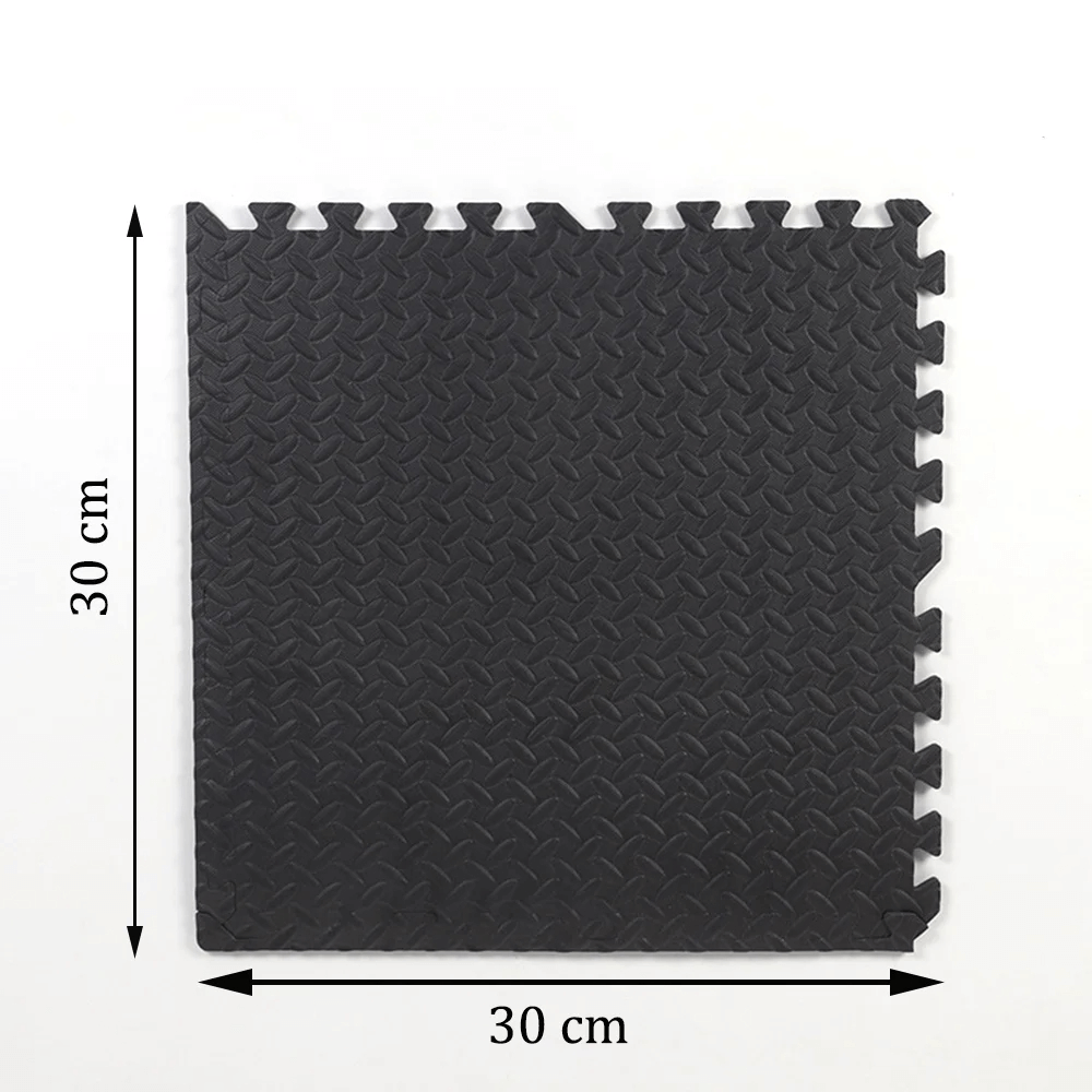 Black 30x30cm EVA foam gym floor mat with interlocking edges, perfect for home gym and workout areas.