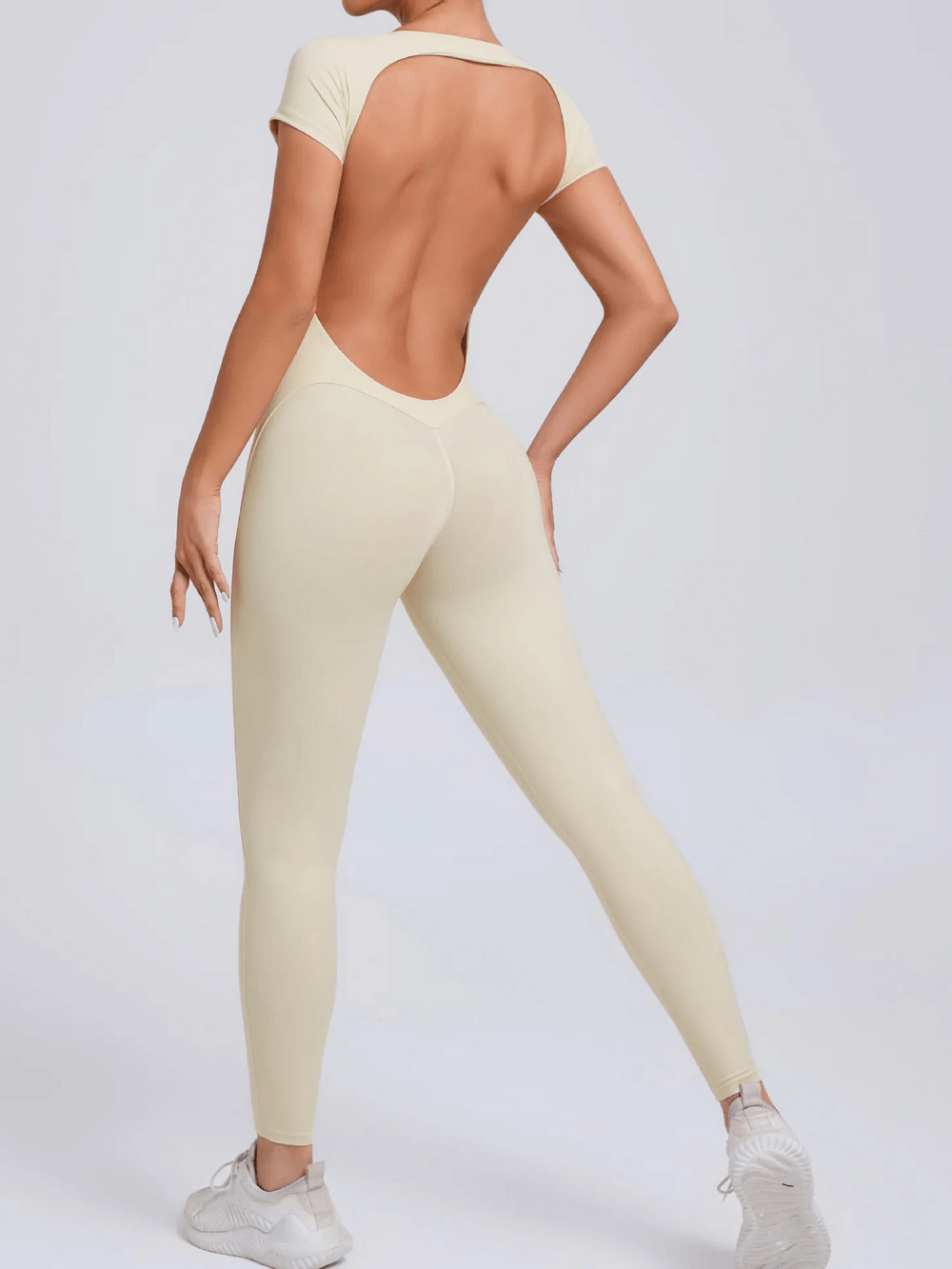 Alt Tag: Gym Open Back Yoga Jumpsuit with Short Sleeves - SF4291 women’s slim fit short sleeve one-piece with bold open back, beige quick-dry