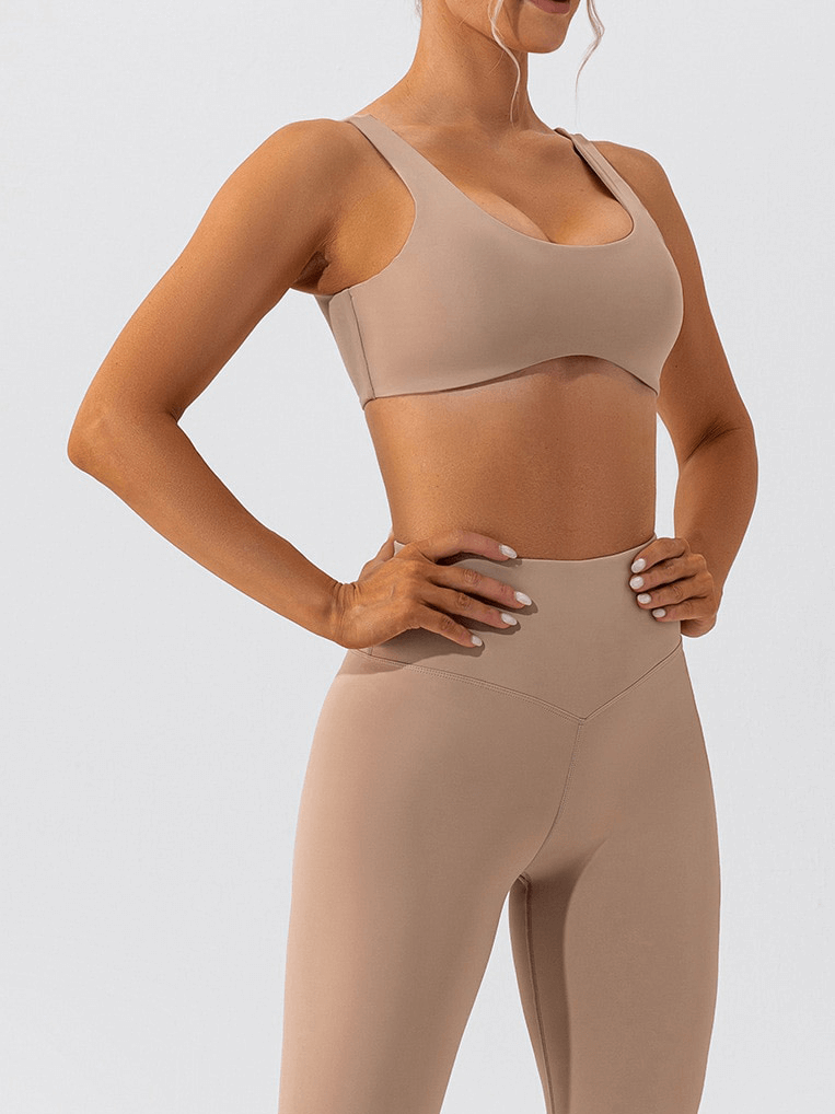 Woman modeling Gym Workout Breathable Seamless Sports Bra SF1314, showing comfort and fit for yoga enthusiasts.