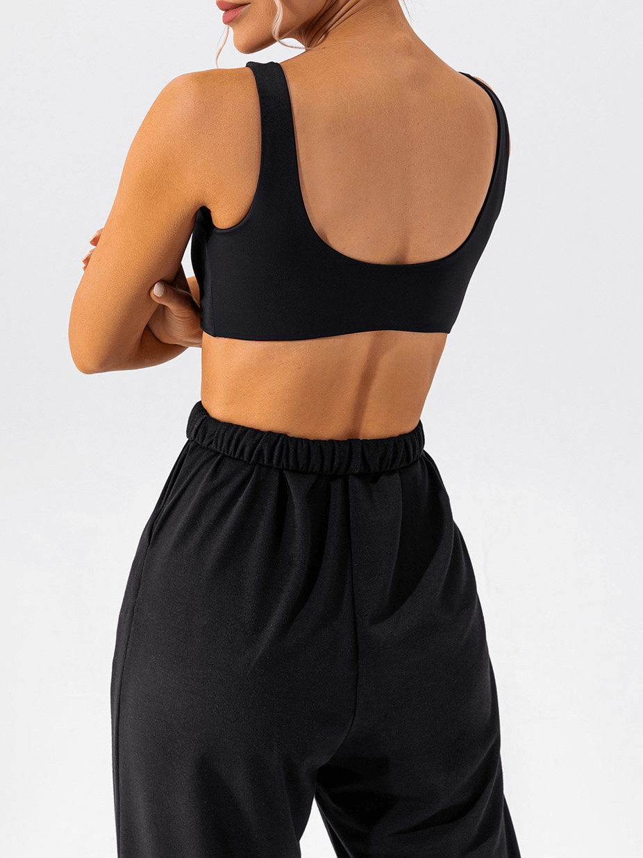 Woman wearing a breathable seamless sports bra, ideal for gym workouts and yoga practice, shown from the back for style and fit.