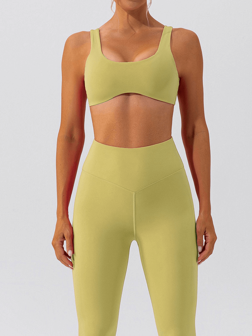 Woman wearing a breathable seamless sports bra for gym workouts, showcasing support and comfort for active lifestyles.