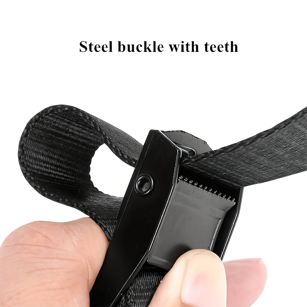 Close-up of a steel buckle with teeth on a black adjustable strap for gymnastic rings, showing durability and grip.