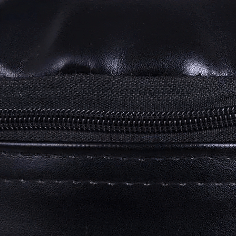 Close-up of durable synthetic leather stitching on the SF2720 hanging punching bag, ideal for boxing and martial arts training.