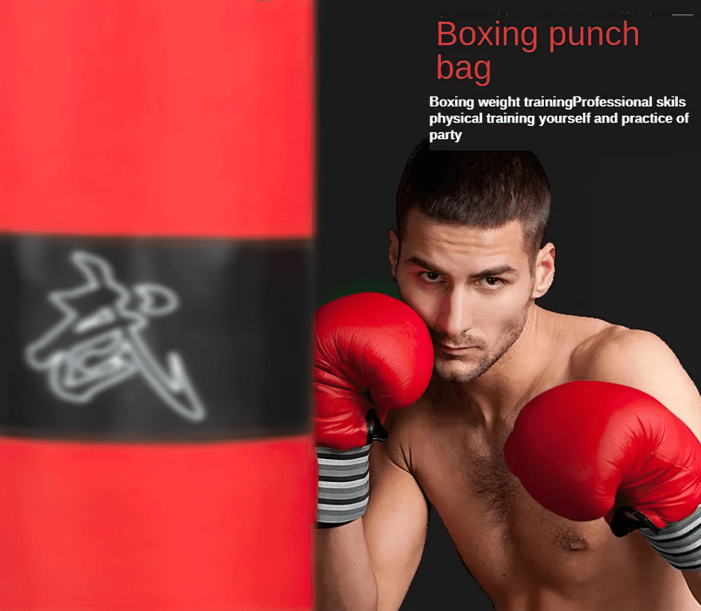 Boxer in red gloves training with a heavy-duty punch bag, ideal for gym and home martial arts and fitness workouts.