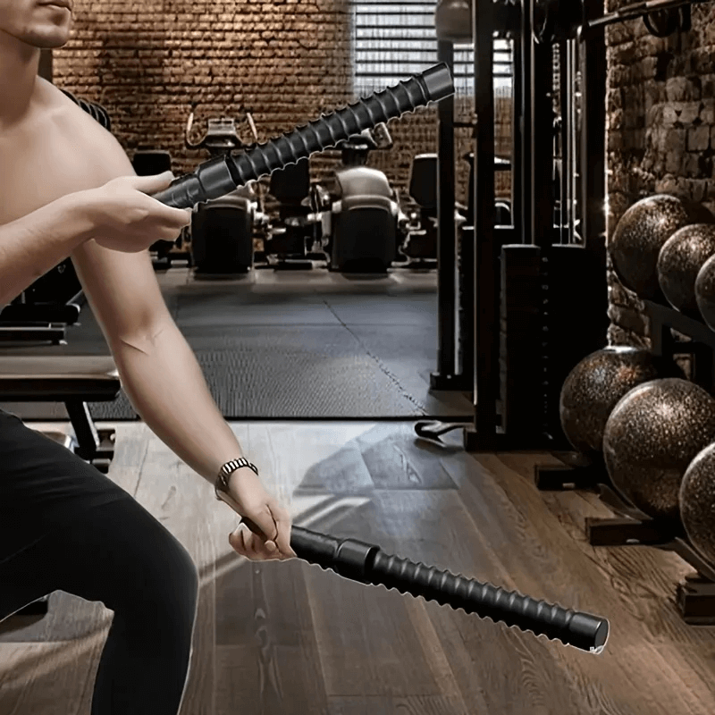 Man using Heavy Duty Power Twister Bar in gym for arm and chest workout, featuring adjustable resistance and anti-slip handles.
