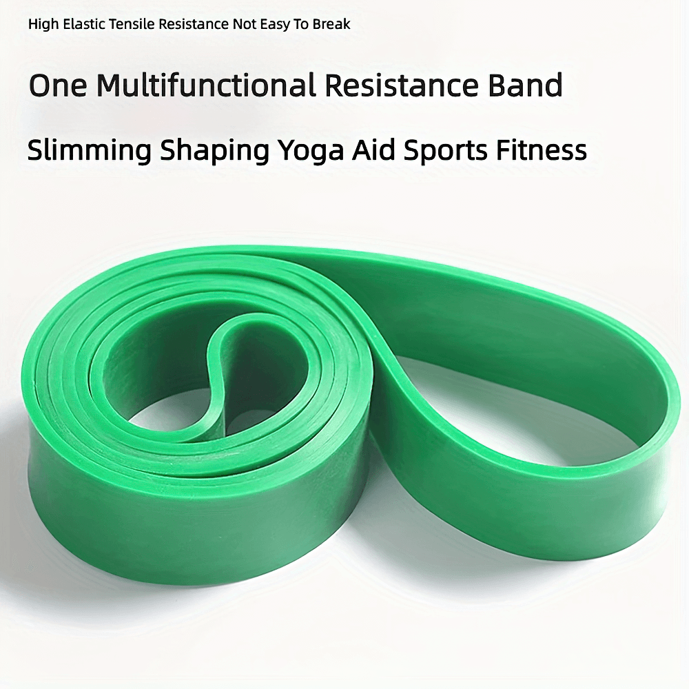 Green heavy-duty resistance band for strength training, ideal for yoga and fitness. Durable and multifunctional for gym and home workouts.