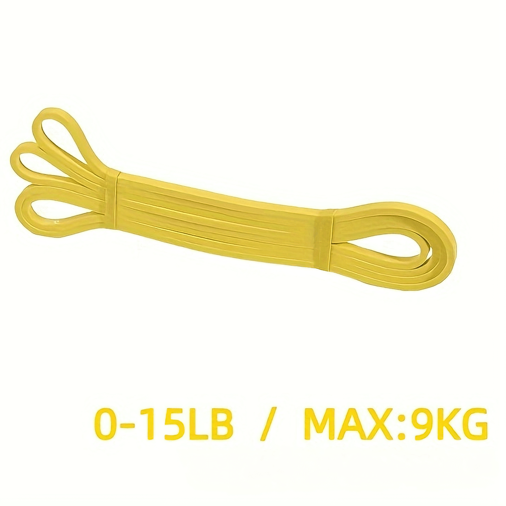 Yellow heavy-duty resistance band with 0-15lb or max 9kg capacity for strength training and fitness at home or gym.