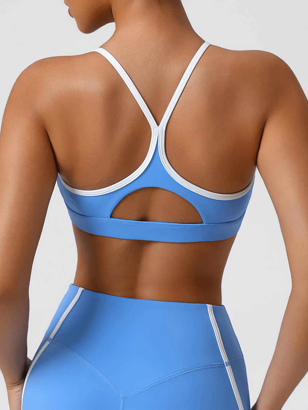 High Impact Racerback Sports Bra with Contrast Trim - SF4063, back view, showcasing quick-dry breathable fabric in blue and white trim.