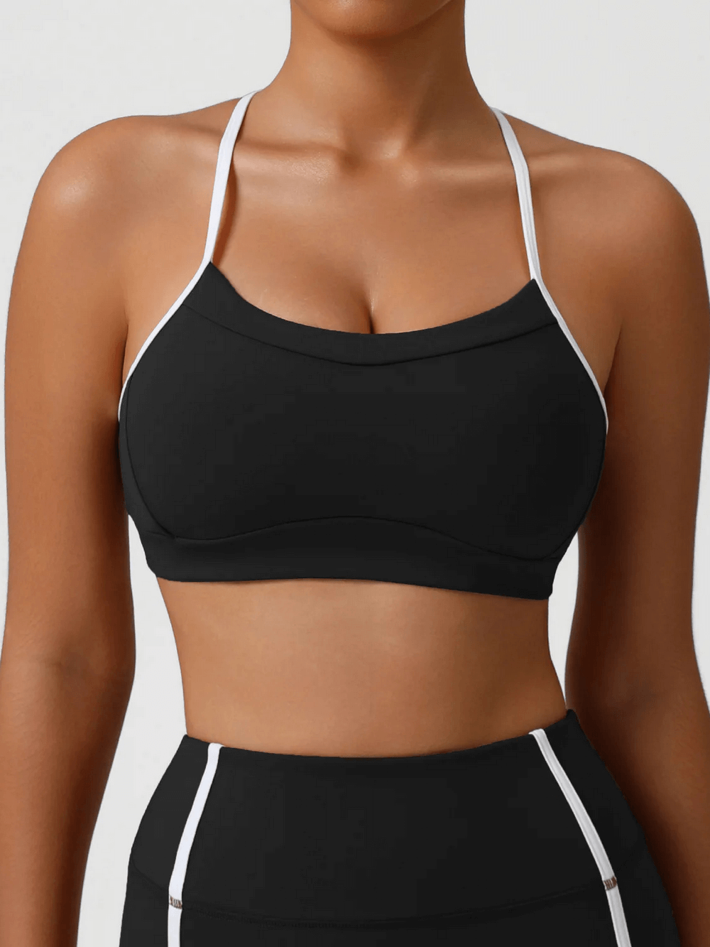 High Impact Racerback Sports Bra with Contrast Trim - SF4063 in sleek black with white trim, perfect for yoga and training sessions.