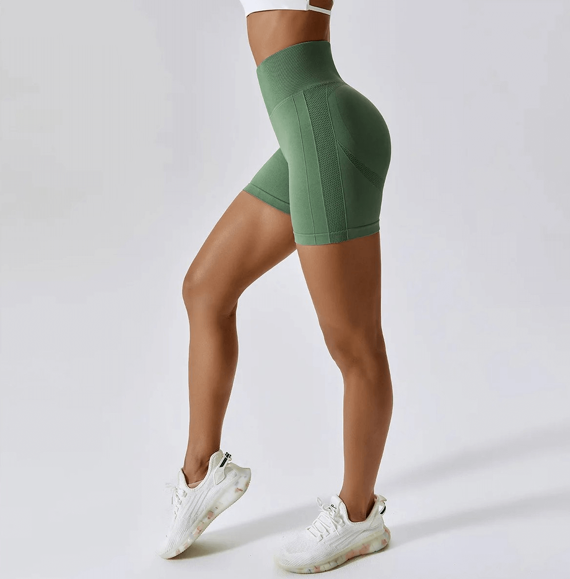 Green high-performance nylon spandex yoga shorts for women, ideal for yoga, running, and cycling. SF2210 design highlights comfort.