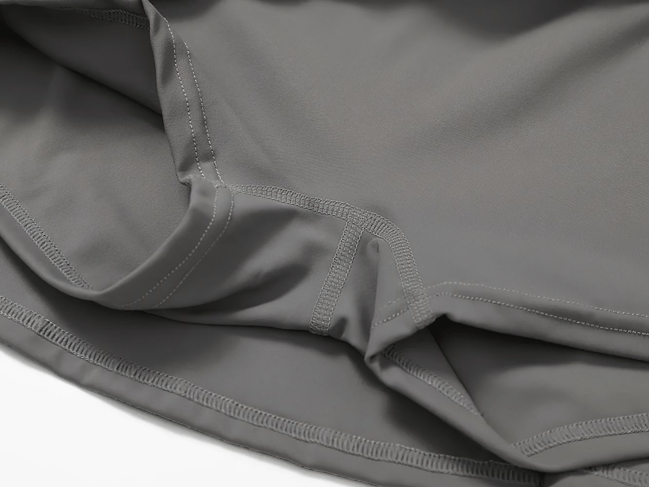 Alt Tag: High Waist Fitness Skirt with Hidden Inner Shorts - SF4433 close-up of hidden inner shorts stitching for yoga, tennis, running