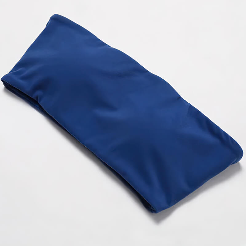 Folded blue high waist yoga leggings and push up sports bra set showcasing nylon fabric texture.