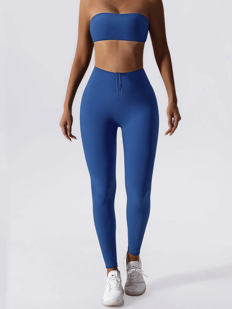 Blue high waist leggings and push-up sports bra yoga set, offering comfort and support, perfect for fitness and yoga activities.