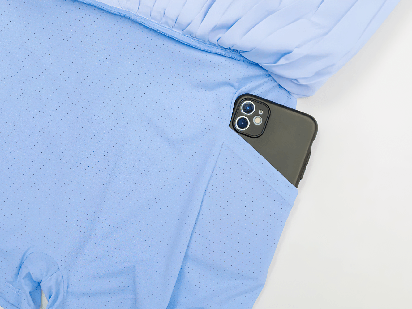 High Waist Pleated Active Skort for Tennis and Golf - SF4564 with smartphone pocket in light blue fabric.