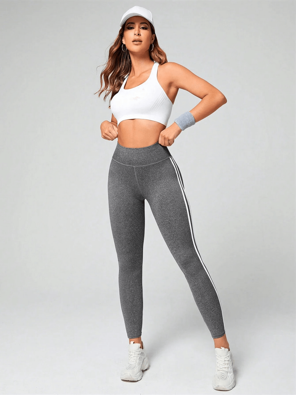 Woman wearing High Waist Side Stripe Sports Leggings for Women - SF4019, ideal for workouts with tummy control and sporty elongated look.