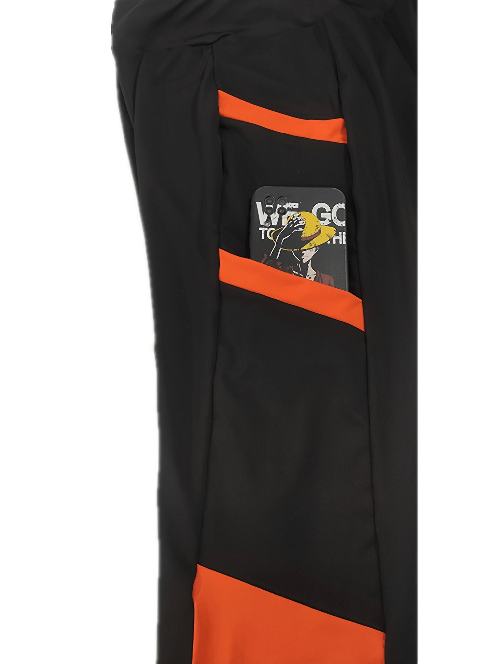 High waist skinny pants with bold color block design and side pockets, featuring vibrant orange and black polyester fabric.