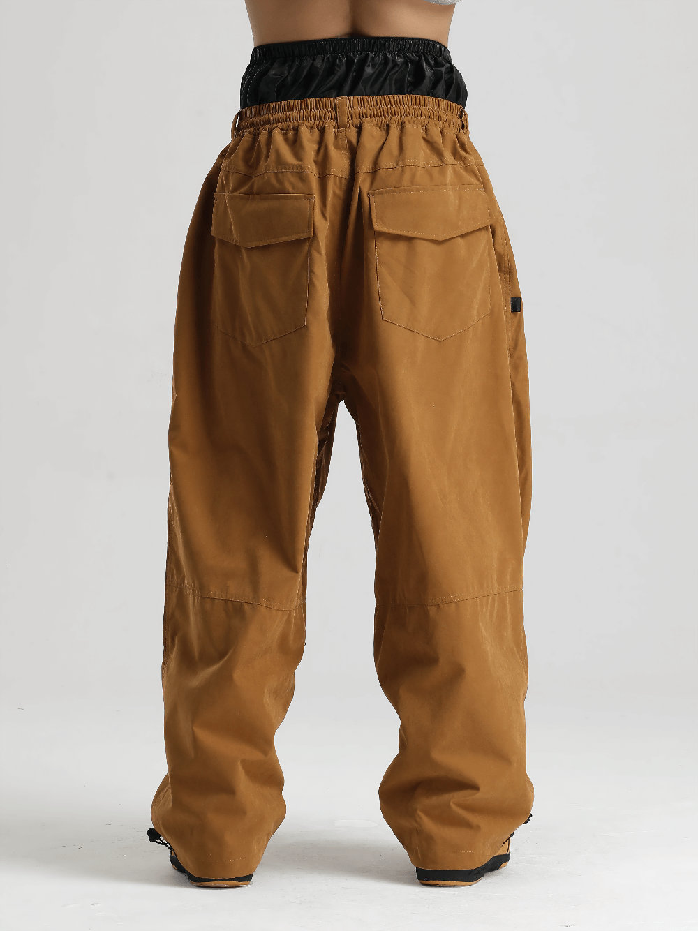 Back view of High Waist Snowboard Pants with Vent Zippers - SF4241 in brown, showcasing loose fit and adjustable waist.