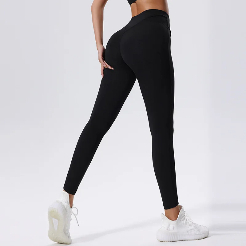 Sleek black high waist yoga pants for ultimate flexibility and style, perfect for workouts and yoga sessions.
