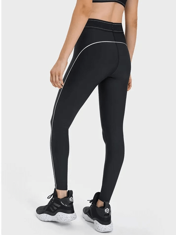 High-waisted gym leggings SF1806 in black with elastic waist and white trim, ideal for workouts, yoga, and running.