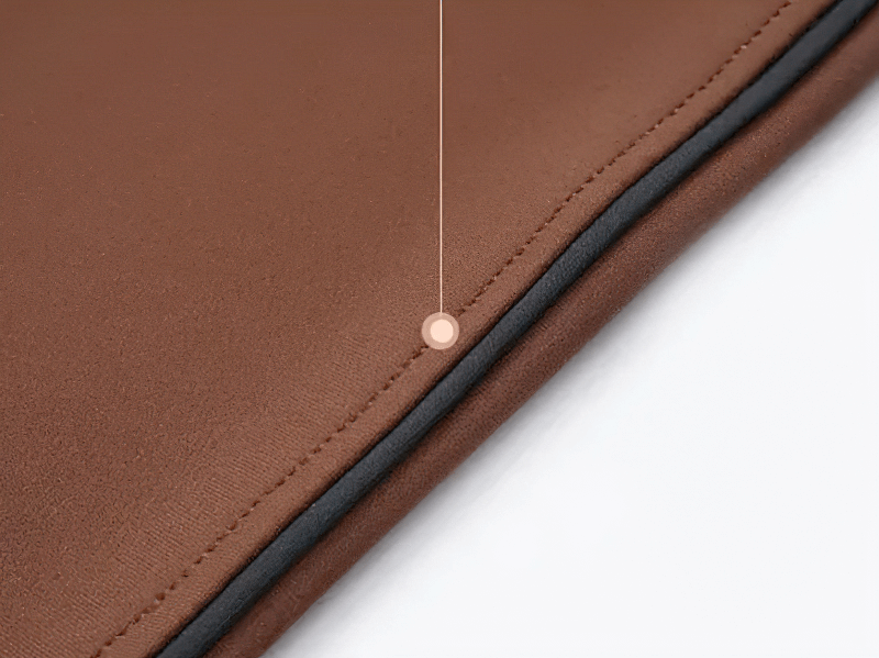 Close-up of high-waisted gym leggings seam, showcasing the premium broadcloth fabric and stitching.