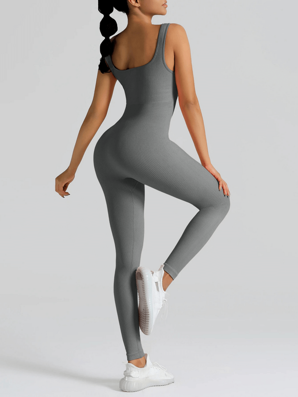 Alt Tag: High Waisted Seamless Yoga Jumpsuit for Women - SF4301 gray seamless ribbed one-piece workout romper, back view, peach booty sculpting