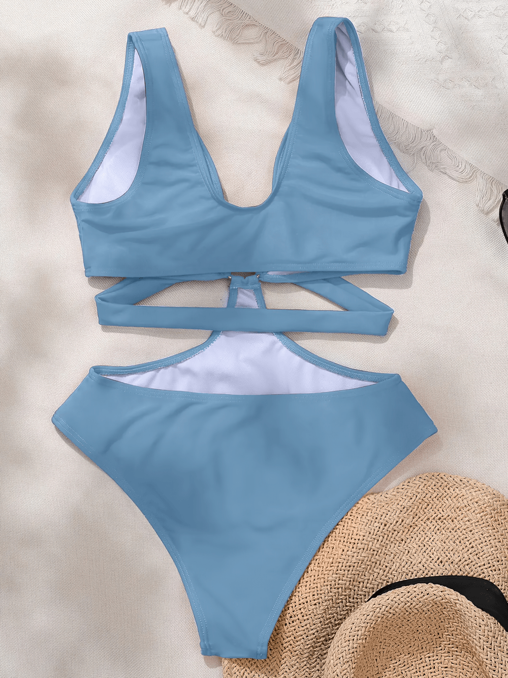 Hollow Out Deep-V One-Piece Beach Swimwear - SF4759, stylish blue monokini with cut-out design, perfect for summer vacations.