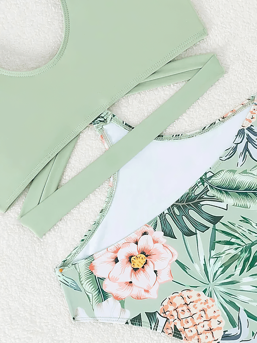Hollow Out Deep-V One-Piece Beach Swimwear - SF4759 featuring a stylish green top and floral bottom.