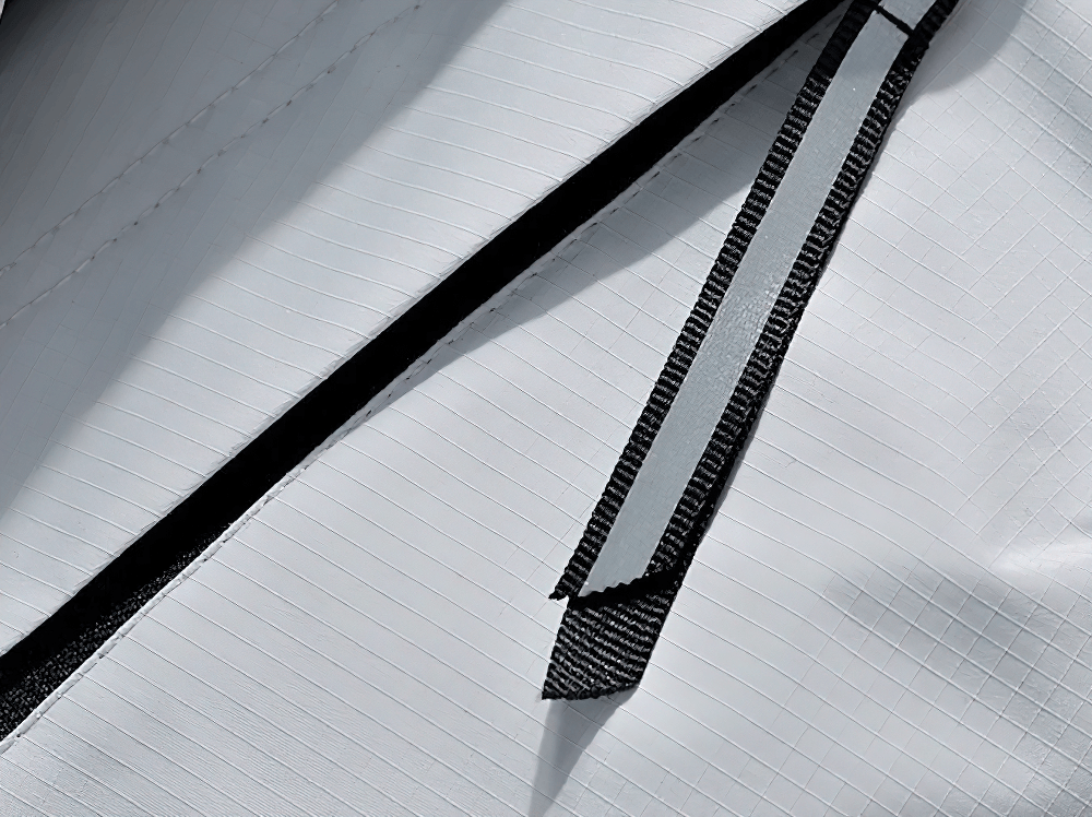 Close-up of Hooded Hiking Jacket with Contrast Stripe Panels - SF4735 showcasing the zipper and stylish panels.