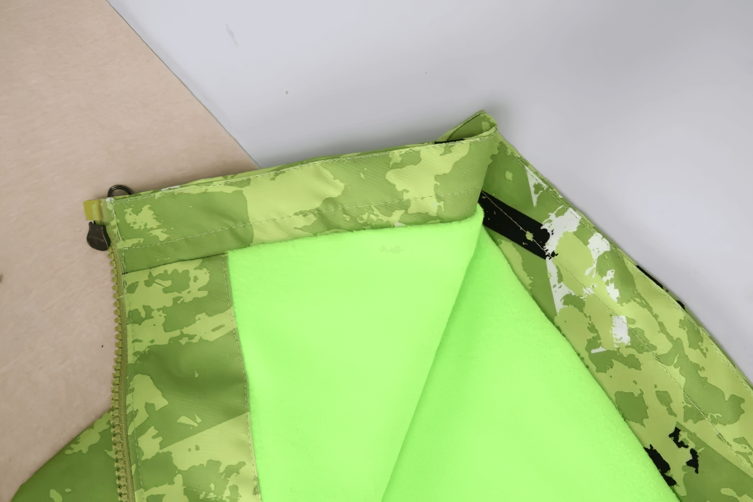 Hooded Windbreaker Jacket with Camo Print - SF3847, kids raincoat detail showing bright green interior and camo design.