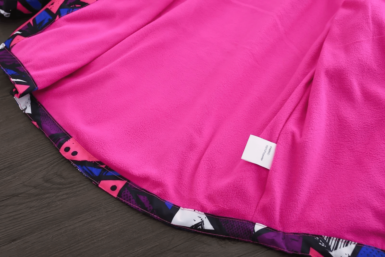 Inside lining detail of Hooded Windbreaker Jacket with Camo Print - SF3847 in bright pink and patterned trim