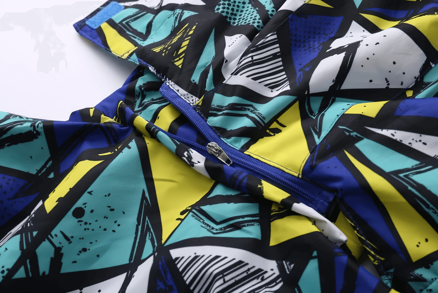 Close-up of Hooded Windbreaker Jacket with Camo Print - SF3847 showing vibrant camo pattern and zipper detail.